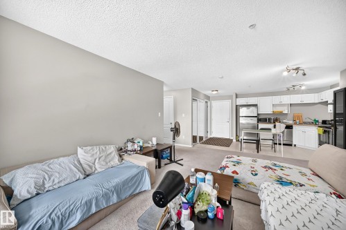 #221 5350 199 St Nw, Edmonton, AB - Indoor Photo Showing Living Room