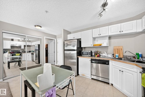 #221 5350 199 St Nw, Edmonton, AB - Indoor Photo Showing Kitchen With Stainless Steel Kitchen With Double Sink