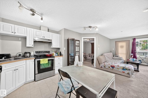 #221 5350 199 St Nw, Edmonton, AB - Indoor Photo Showing Kitchen With Stainless Steel Kitchen