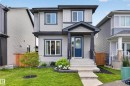 Contemporary two-story residence featuring light gray siding and dark gray trim - 548 Kleins Crescent, Leduc, AB 
