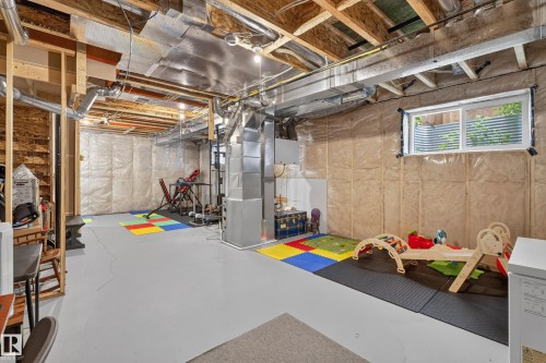 Unfinished basement offering expansive potential for customization - 548 Kleins Crescent, Leduc, AB 
