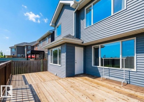 Expansive wooden deck providing ample outdoor space - 16627 18 Avenue, Edmonton, AB 