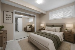 Bedroom featuring light-colored wall paint and carpet flooring - 