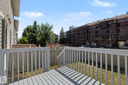 Wood-finish deck with painted railings - 