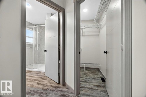 Modern interior doors with contemporary black hardware - 1 Whitetail Way, Mundare, AB 