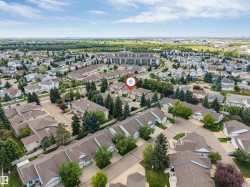 Residential area featuring a mix of townhomes and single-family residences - 