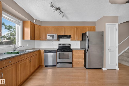 #62 171 Brintnell Blvd Nw, Edmonton, AB - Indoor Photo Showing Kitchen