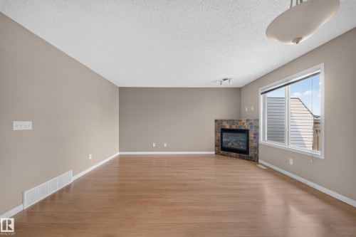 #62 171 Brintnell Blvd Nw, Edmonton, AB - Indoor With Fireplace