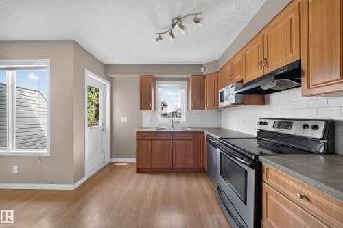 #62 171 Brintnell Blvd Nw, Edmonton, AB - Indoor Photo Showing Kitchen With Double Sink