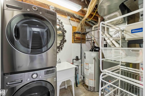 Stackable stainless steel washer and dryer unit, utility sink, and water heater - 1 14315 Stony Plain, Edmonton, AB 