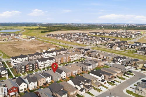 Aerial perspective of a developed residential area with surrounding green spaces and a body of water - 2508 193 Street, Edmonton, AB 