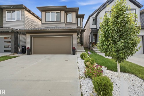 Modern two-story residence featuring a neutral-toned exterior with distinct architectural lines - 2508 193 Street, Edmonton, AB 
