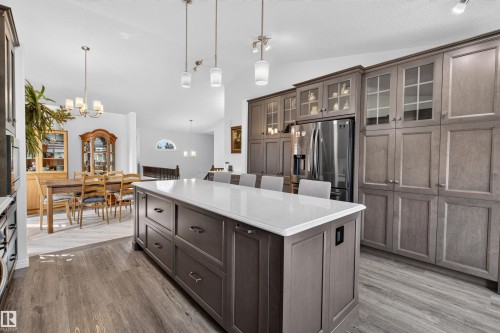 Expansive kitchen island with white countertop - 5006 53 Avenue, Cold Lake, AB 