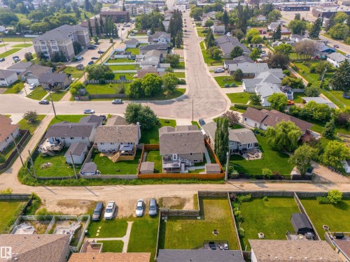 Aerial perspective of a residential neighborhood featuring detached homes on individual lots - 5006 53 Avenue, Cold Lake, AB 