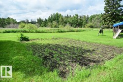 Productive garden plot awaits your favorite produce or flowers- grow your own, eat fresh, savor the goodness. A dedicated garden space for planting, canning, and freezing your own homegrown produce. - 