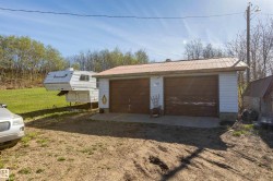detached double garage new door waiting to be installed  use for auto, hobbies, storage, etc - 