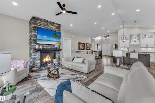 5052 Lakeshore Drive, Sylvan Lake, AB - Indoor Photo Showing Living Room With Fireplace