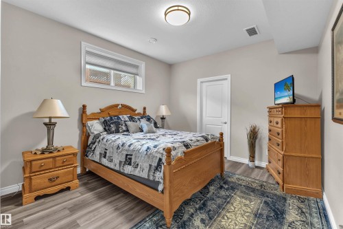 5052 Lakeshore Drive, Sylvan Lake, AB - Indoor Photo Showing Bedroom