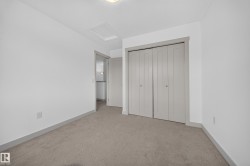 Neutral-toned carpeting paired with white walls - 