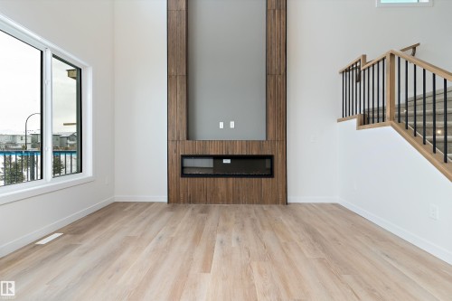 5 Axelwood Crescent, Spruce Grove, AB - Indoor Photo Showing Other Room With Fireplace