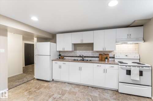 8911 149 Street, Edmonton, AB - Indoor Photo Showing Kitchen With Double Sink