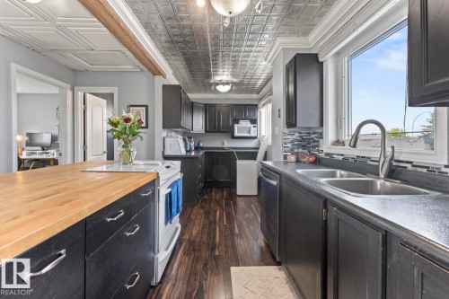 1802 12 Street, Cold Lake, AB - Indoor Photo Showing Kitchen With Double Sink