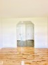 Bright interior featuring light wood-finish flooring - 3120 25 Avenue, Edmonton, AB 