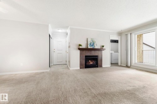 212 40 Alpine Place, St. Albert, AB - Indoor Photo Showing Living Room With Fireplace