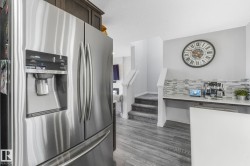 Stainless steel refrigerator with ice and water dispenser - 