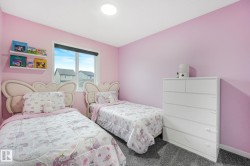 Room featuring an expansive window, gray carpet, and recessed ceiling lighting - 