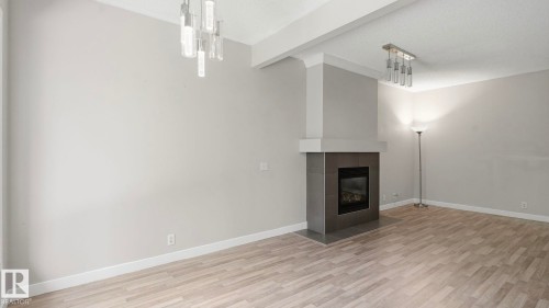 #24 6410 134 Av Nw, Edmonton, AB - Indoor With Fireplace