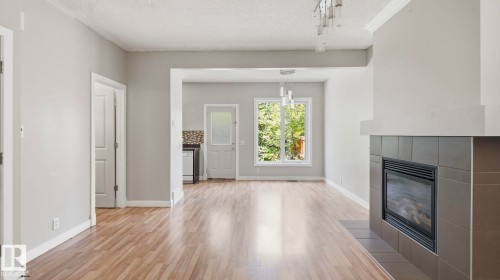 #24 6410 134 Av Nw, Edmonton, AB - Indoor With Fireplace