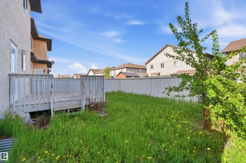 Rear wood-decked patio with slatted railing - 16807 54 Street, Edmonton, AB - Outdoor