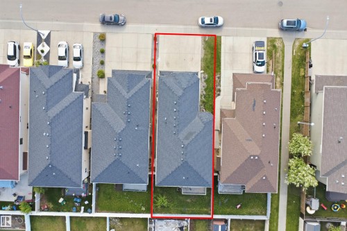 Aerial perspective showcasing the property's footprint with a dark-shingled roof - 16807 54 Street, Edmonton, AB - Other