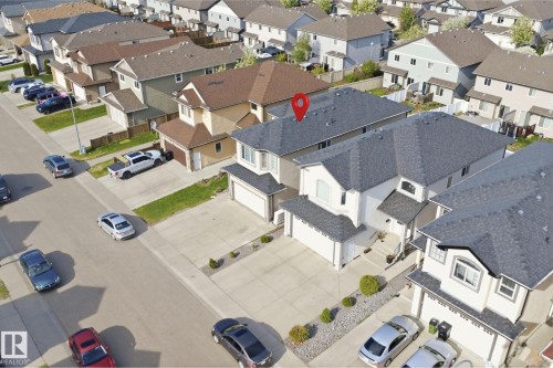 Elevated view of a residential street featuring a two-story home with a two-car garage - 16807 54 Street, Edmonton, AB -  With View