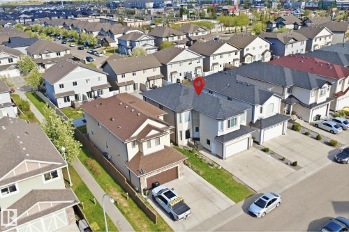 Contemporary two-story residence with an attached double-car garage - 16807 54 Street, Edmonton, AB - Outdoor With View