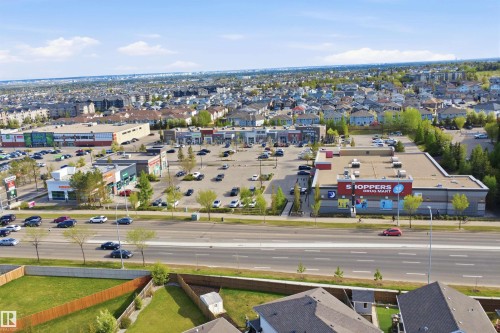 Neighborhood featuring established commercial retail centers and residential properties - 16807 54 Street, Edmonton, AB - Outdoor With View
