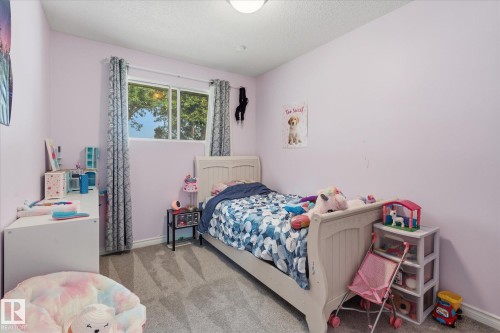 8529 95 Avenue, Fort Saskatchewan, AB - Indoor Photo Showing Bedroom