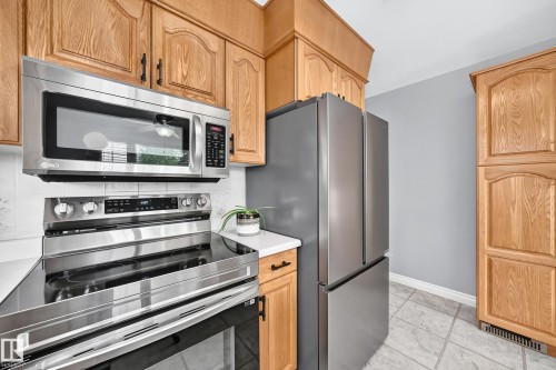 7916 130 Avenue Nw, Edmonton, AB - Indoor Photo Showing Kitchen With Stainless Steel Kitchen