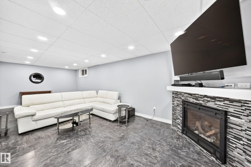 7916 130 Avenue Nw, Edmonton, AB - Indoor With Fireplace