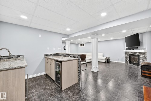 7916 130 Avenue Nw, Edmonton, AB - Indoor With Fireplace
