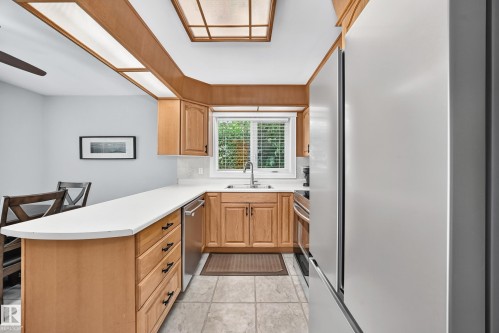 7916 130 Avenue Nw, Edmonton, AB - Indoor Photo Showing Kitchen With Double Sink