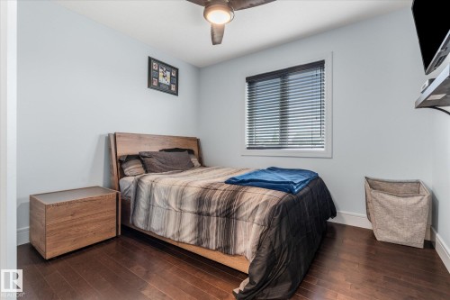 Hardwood flooring extending throughout the room - 6 Sedona Place, Fort Saskatchewan, AB - Indoor Photo Showing Bedroom