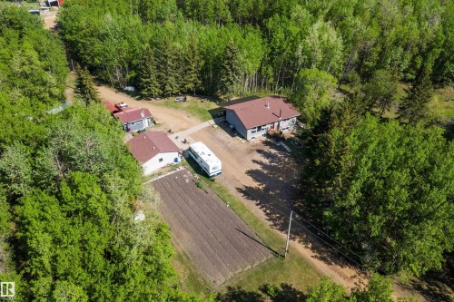 Aerial perspective showcasing a single-story home with a brown roof and a second auxiliary building - 53257 Rge Road 211, Rural Strathcona County, AB - Outdoor With View