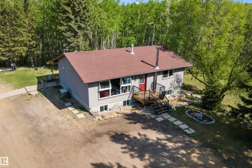 Split-level residence featuring a brown shingle roof and a light gray exterior - 53257 Rge Road 211, Rural Strathcona County, AB - Outdoor