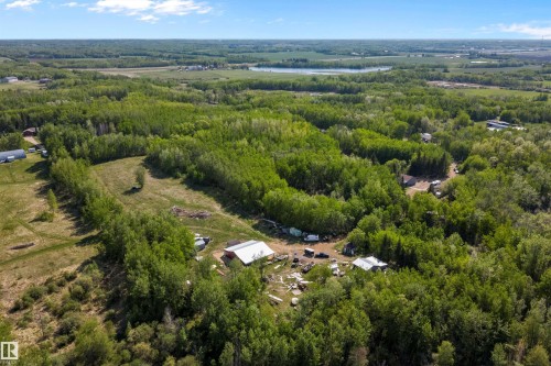 Expansive wooded property featuring multiple clearings and a visible outbuilding with a metal roof - 53257 Rge Road 211, Rural Strathcona County, AB - Outdoor With View