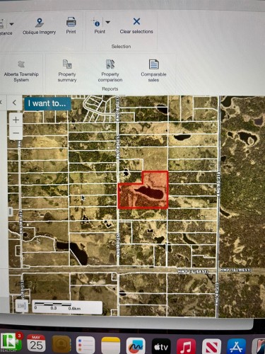 GIS Property Mapping Interface. Displaying a selected property within a grid system, including options for property summary and comparable sales - 53257 Rge Road 211, Rural Strathcona County, AB - Other