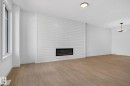 109 Westwind Drive, Spruce Grove, AB  - Indoor Photo Showing Living Room With Fireplace 