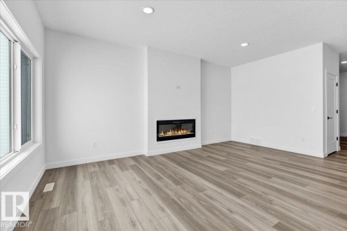 139 Caledon Crescent, Spruce Grove, AB - Indoor Photo Showing Living Room With Fireplace