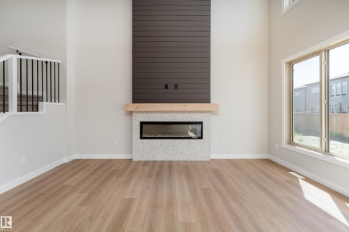 117 Garneau Gate, Spruce Grove, AB - Indoor Photo Showing Living Room With Fireplace